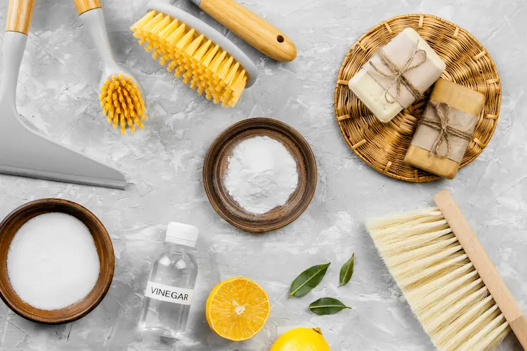 https://doablesimplicity.com/wp-content/uploads/2020/03/top-view-eco-cleaning-products-with-baking-soda-brushes.webp