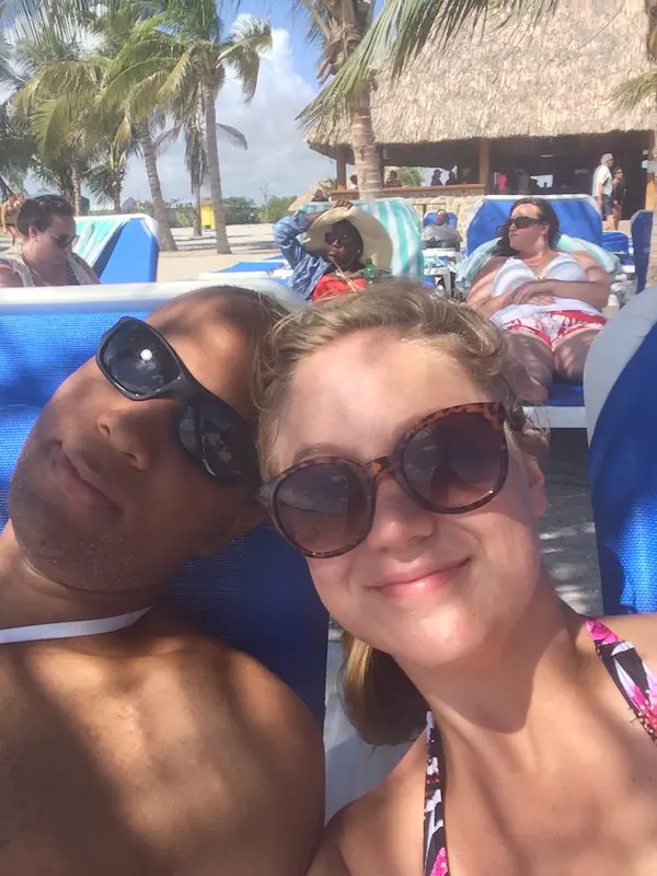 me and my husband on beach in beliz