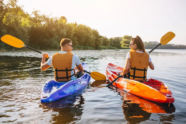 couple together kayaking

