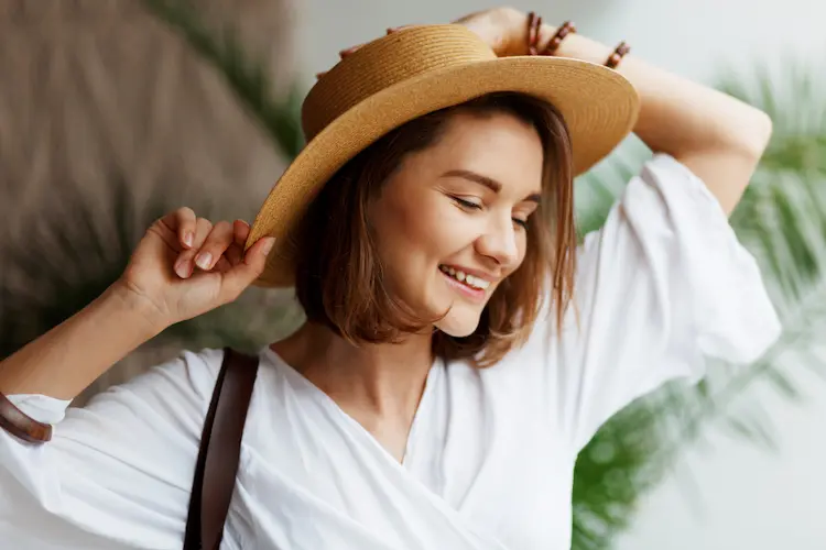 happy young girl with hat