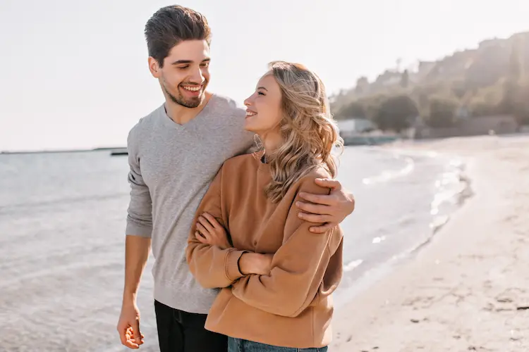 couple walking on beach