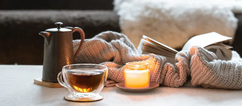 tea blankets and candle 