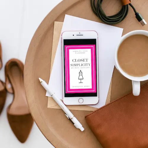 closet simplicity ebook on iphone on side table with coffee shoes on floor