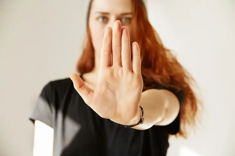 woman with stop hand out