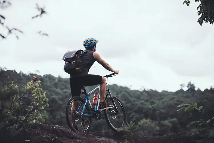 cyclist on sunny day adventure experiences active