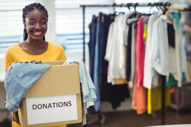 volunteer donations box decluttering clothing thrift store