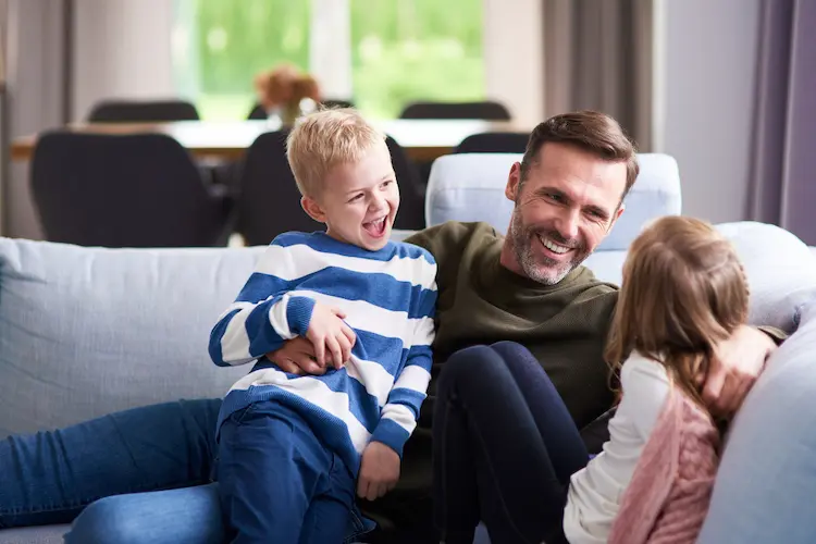 happy dad spending time with kids