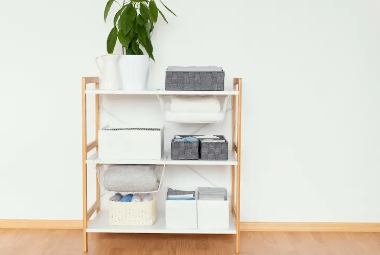 organized baskets and bins on shelf simple organizing solutions organized home