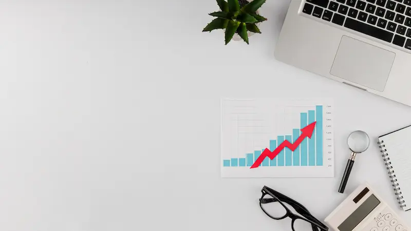 top view office desk with growth chart copy space