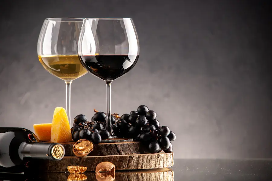 glasses of wine with grapes