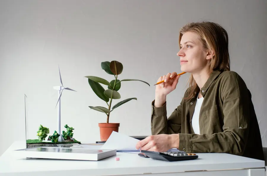 woman working thinking about environment sustainable living